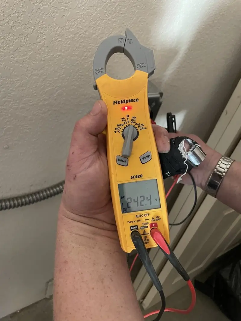 Voltage testing with clamp meter during Hot Tub / Pool Electrical Wiring in Jackson
